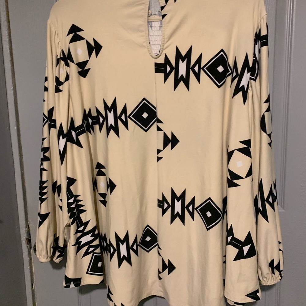 LuLaRoe Beige and Black Patterned Blouse